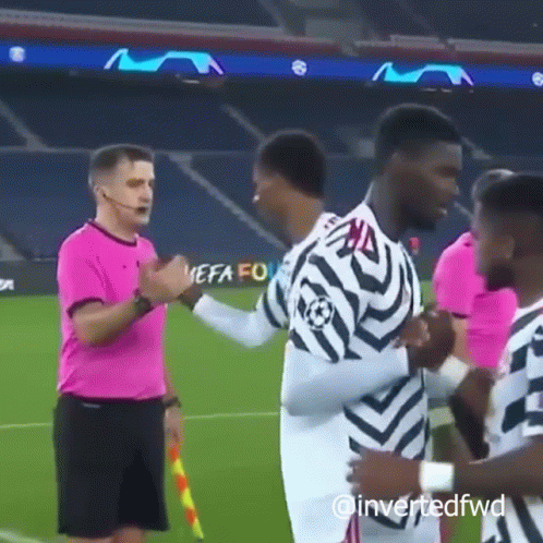 Two Soccer Players On Field With Crowd GIF