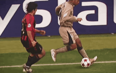Two Soccer Players On Field With Crystal Sign GIF
