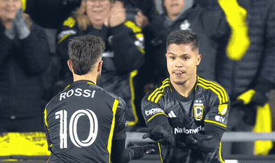 Two Soccer Players One Of Whom Has The Number 10 On Their Jersey GIF