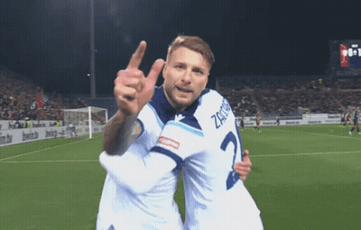 Two Soccer Players One Of Whom Has The Number 2 On His Shirt GIF