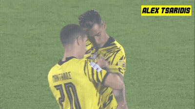 Two Soccer Players One Of Whom Has The Number 20 On Their Jersey GIF