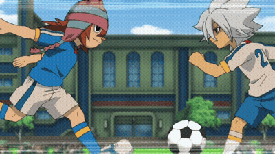 Two Soccer Players One Of Whom Has The Number 21 On Their Jersey GIF