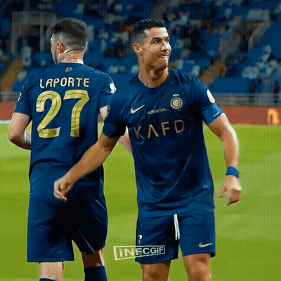 Two Soccer Players One Of Whom Has The Number 27 On His Shirt GIF