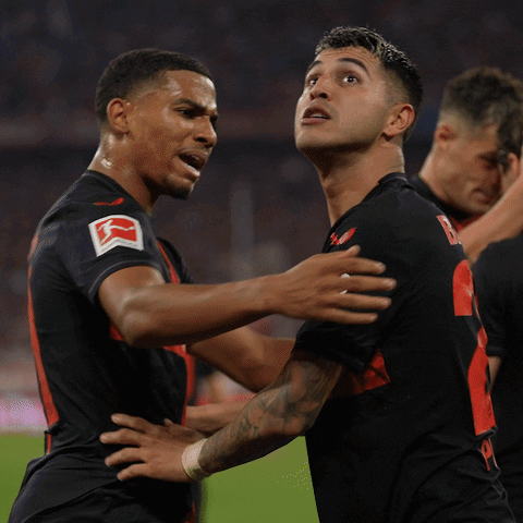 Two Soccer Players One Of Whom Has The Number 8 On His Jersey GIF