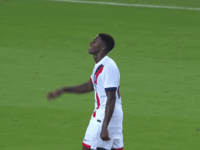 Two Soccer Players One Of Whom Has The Number 9 On His Jersey GIF