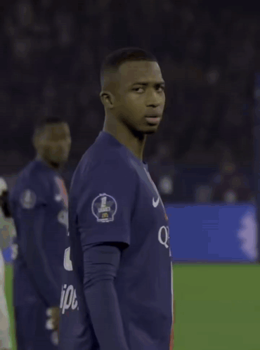 Two Soccer Players One Wearing A Qatar Airways Shirt GIF