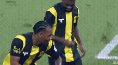 Two Soccer Players One With Letter T GIF
