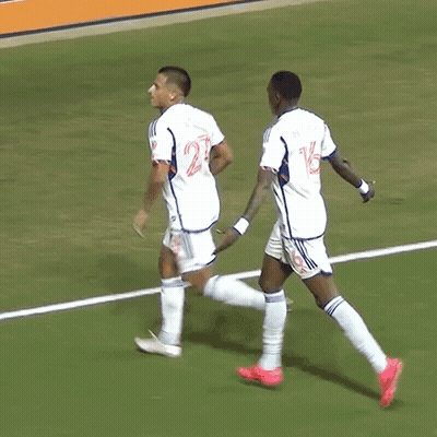 Two Soccer Players, One With Number 14 GIF