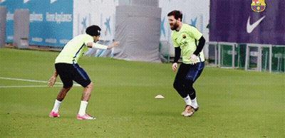 Two Soccer Players Playing Near Nike Logo GIF