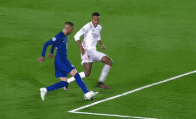 Two Soccer Players Playing Soccer GIF