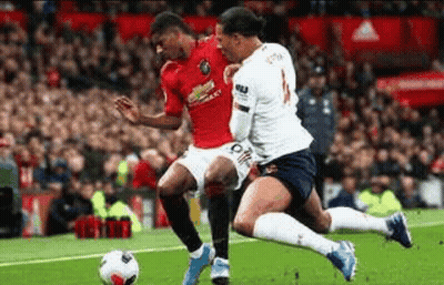 Two Soccer Players Playing Soccer GIF