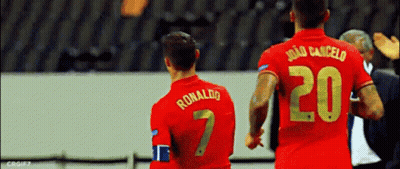 Two Soccer Players Ronaldo And Joao Cancelo GIF
