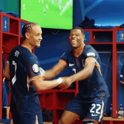 Two Soccer Players Shaking Hands In Locker Room GIF