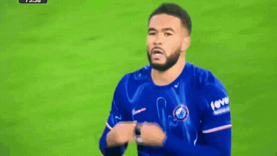 Two Soccer Players Shaking Hands With One Wearing A Fever Shirt GIF