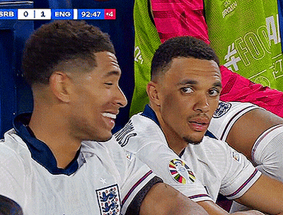 Two Soccer Players Sitting With Scoreboard Eng 92:47 GIF