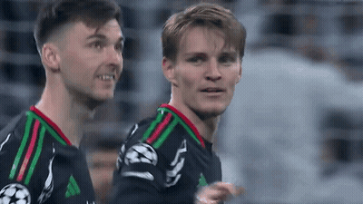 Two Soccer Players Standing And Smiling GIF