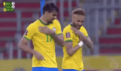 Two Soccer Players Standing Next To Each Other GIF