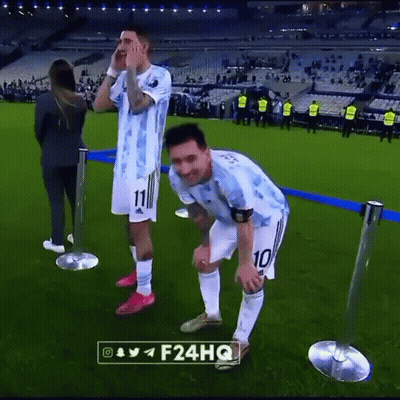 Two Soccer Players Standing On Field GIF