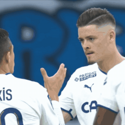 Two Soccer Players Talking One Wearing Parions Sport Jersey GIF