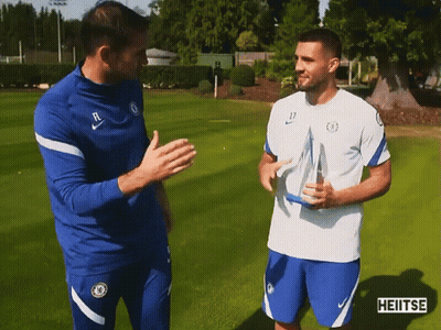 Two Soccer Players Talking With Heitse GIF
