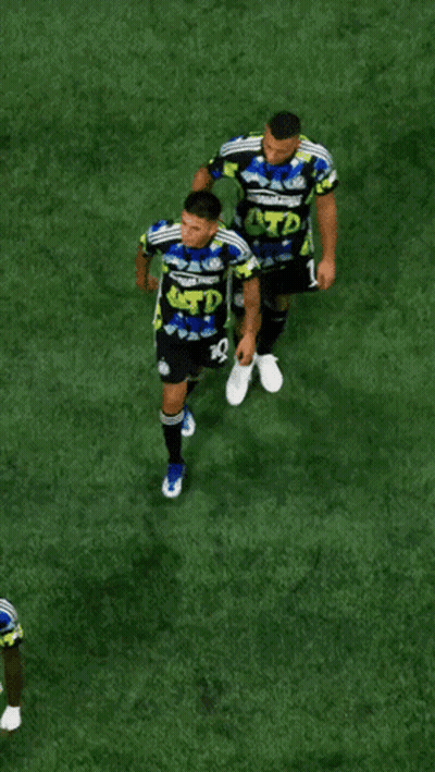 Two Soccer Players Wearing ATD Shirts GIF
