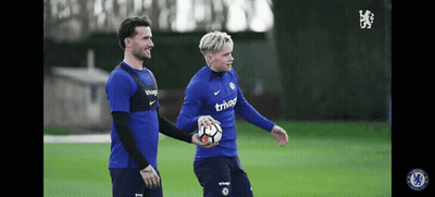 Two Soccer Players Wearing Blue Shirts That Say Trivago GIF