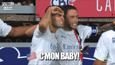Two Soccer Players Wearing Emirates Jerseys Are Hugging Each Other GIF