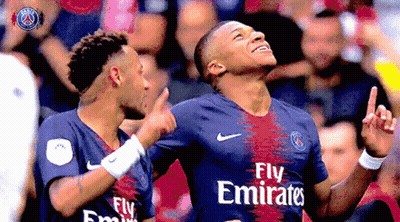 Two Soccer Players Wearing Fly Emirates Uniforms Are Celebrating GIF