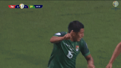 Two Soccer Players Wearing Marathon Jerseys Are Running On The Field GIF