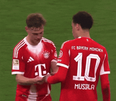 Two Soccer Players Wearing Red Jerseys With The Number 10 On The Back GIF
