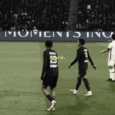 Two Soccer Players With Banner Saying Moments Inu GIF
