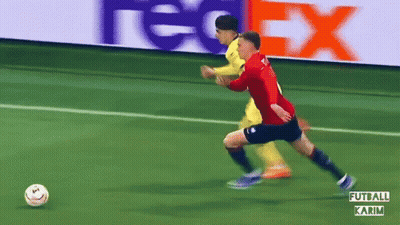 Two Soccer Players With FedEx Banner GIF