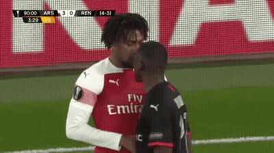 Two Soccer Players With Fly Emirates Jerseys GIF