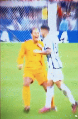 Two Soccer Players With Play Text GIF