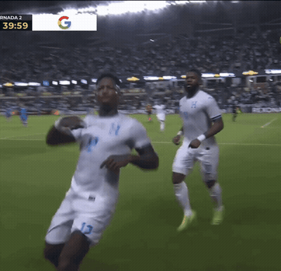 Two Soccer Players With Sign Saying Randa 2 GIF