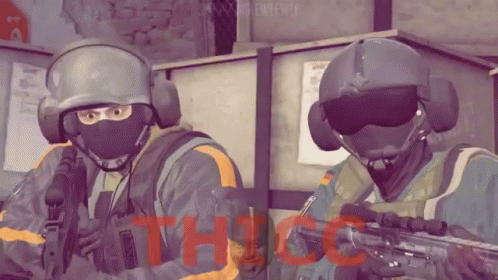 Two Soldiers Are Standing Next To Each Other With The Word Thigh Written In Red GIF