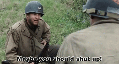 Two Soldiers Are Talking To Each Other And One Of Them Is Saying Maybe You Should Shut Up GIF