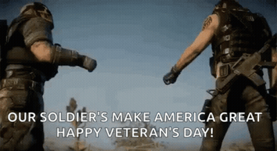 Two Soldiers Fist Bump In Desert GIF