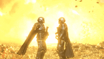Two Soldiers Standing In Front Of Fire GIF