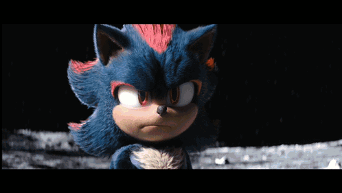 Two Sonic The Hedgehogs Are Standing Next To Each Other In Front Of A Glowing Light . GIF
