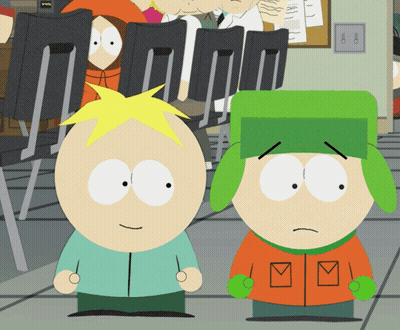 Two South Park Characters Are Standing Next To Each Other And One Has A Letter M On His Jacket GIF