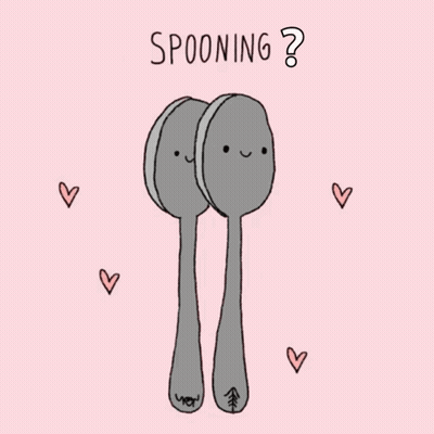 Two Spoons With Faces Saying Spooning