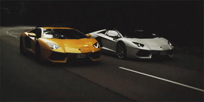 Two Sports Cars Driving With Y License Plate GIF