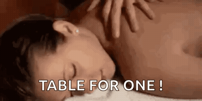 Two Squirrels Laying On Each Other On Brick Wall With Coffee GIF