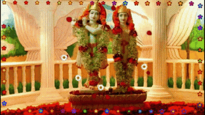 Two Statues Of Krishna And Radha GIF