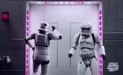 Two Stormtroopers Standing In Front Of Door GIF