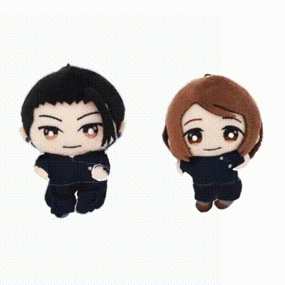 Two Stuffed Animals , A Boy And A Girl , Are Sitting Next To Each Other On A White Background . GIF