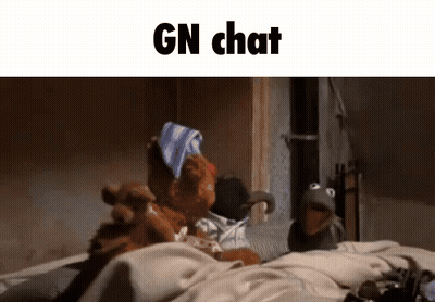 Two Stuffed Animals Are Sitting On A Bed With The Words Gn Chat On The Top GIF