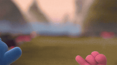 Two Stuffed Animals Are Standing Next To Each Other In A Field GIF