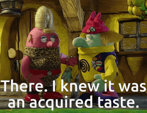 Two Stuffed Animals Are Standing Next To Each Other With The Words " There I Knew It Was An Acquired Taste " GIF